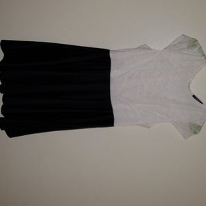 White lace with black bottom swing dress.